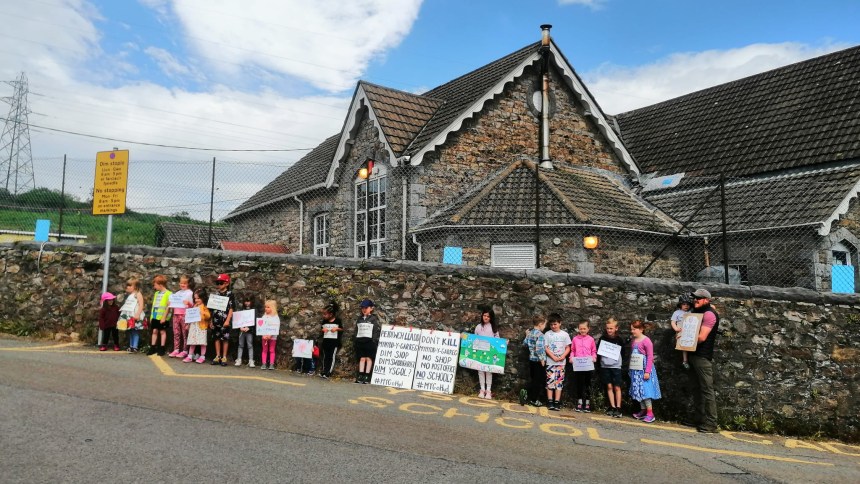 Parents and pupils protest outside Mynyddygarreg School in Carmarthenshire, a campaign Carl Peters‑Bond supported. The school was saved from closure after the community successfully lobbied the council.