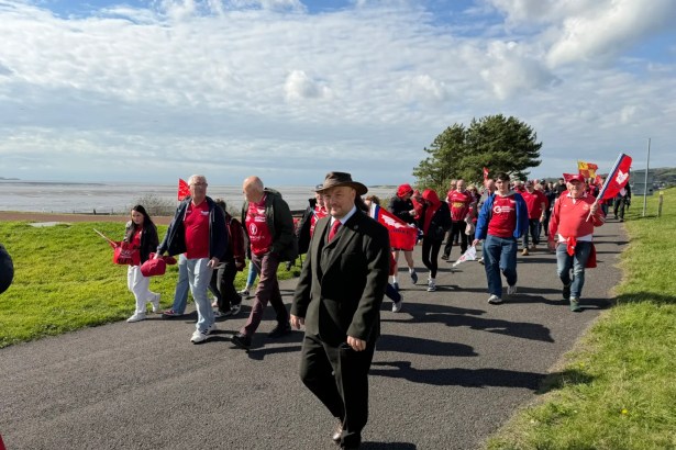 Independent Senedd candidate Carl Peters‑Bond joins the Save Our Scarlets march in Llanelli, warning of the cultural and economic cost of losing the team.