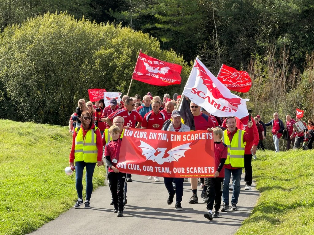 Supporters at the protest march, uniting to defend the club’s future and its place in Welsh rugby culture.