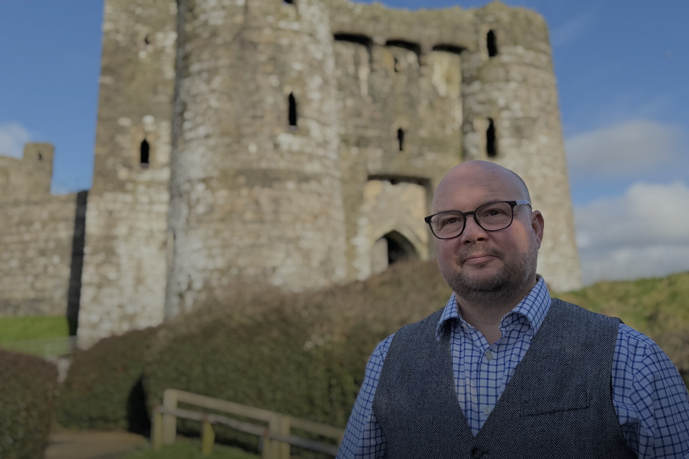 Carl Peters-Bond outside Kidwelly Castle